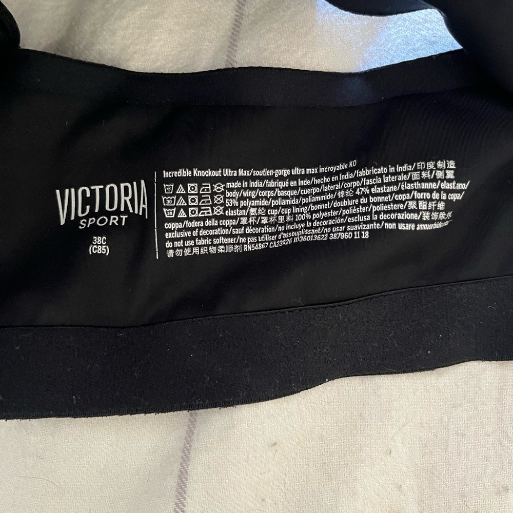 Vicoria Secret sport bra, 38c. Pre loved. Black with pale pink accents